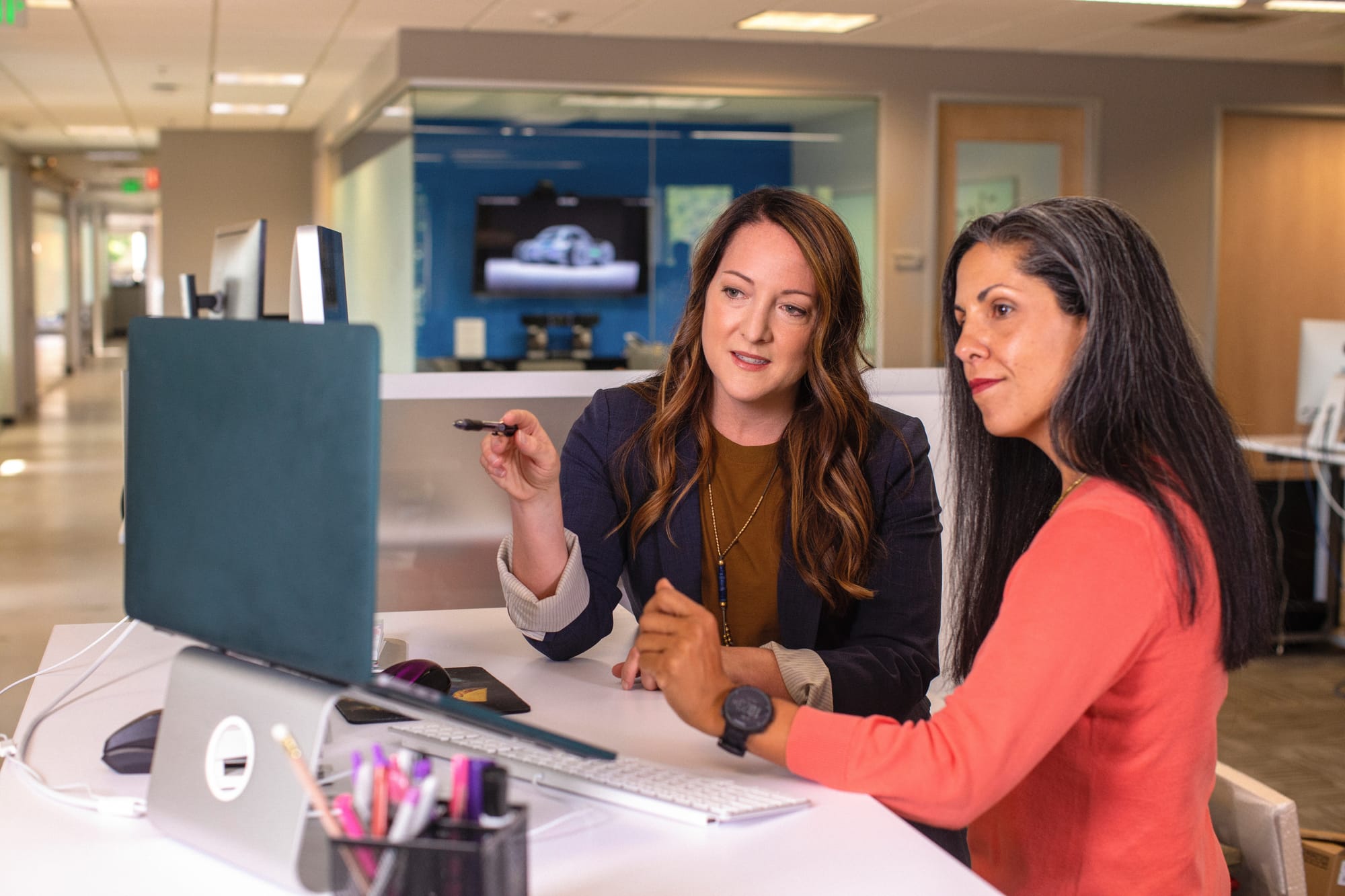 woman showing results of marketing workflow