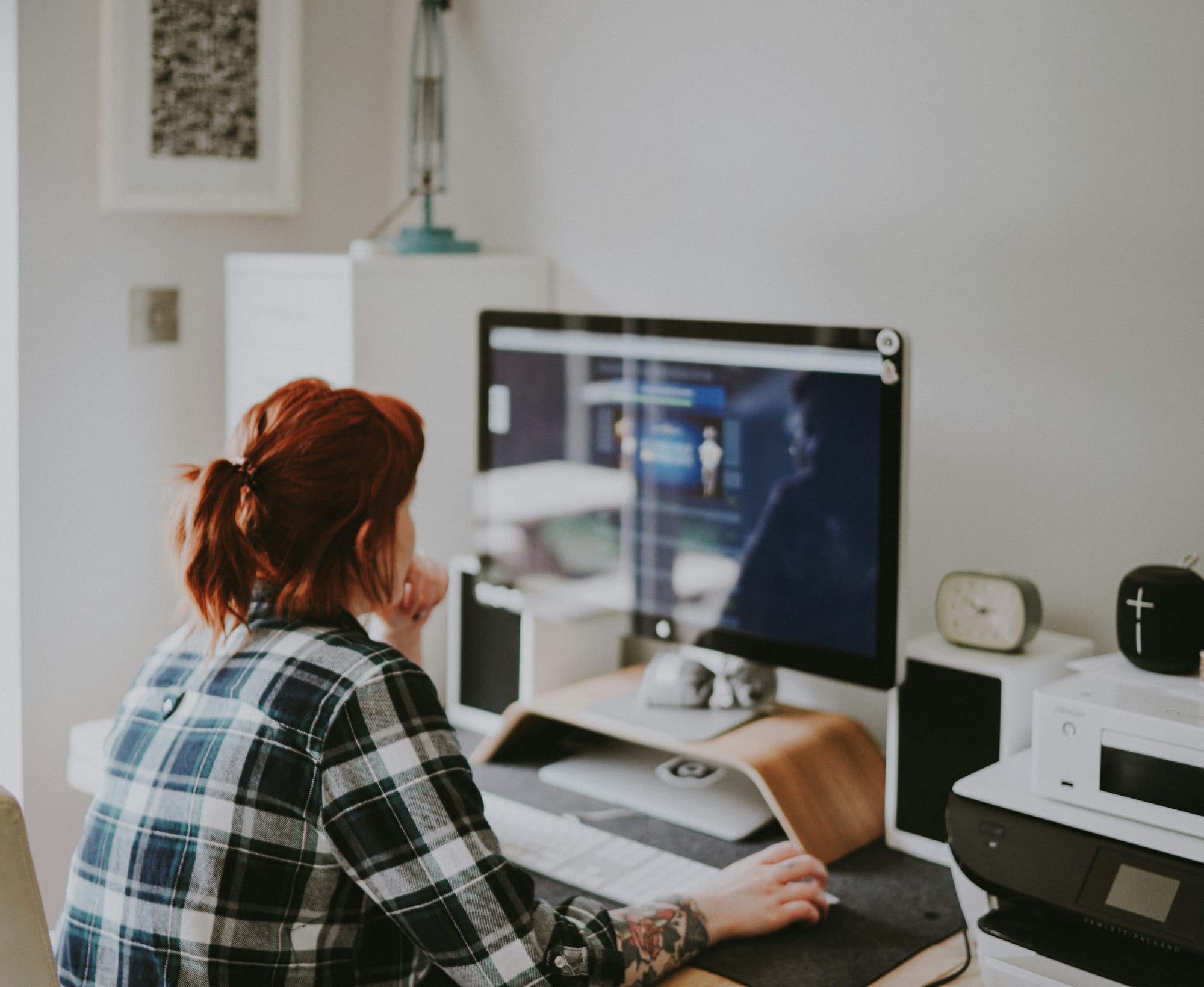 woman working on a no code ai model builder