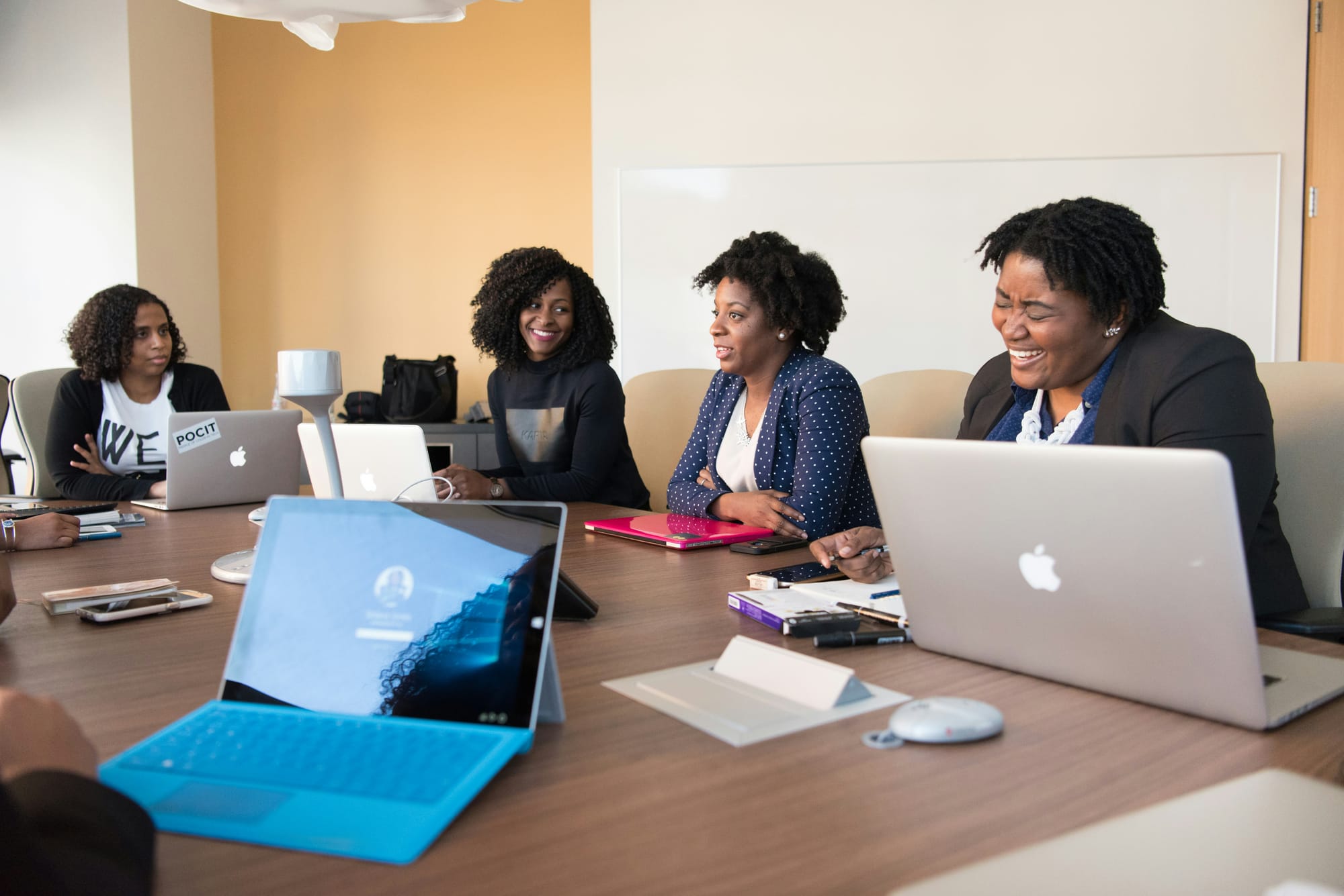 people in board meeting discussing ai workflow