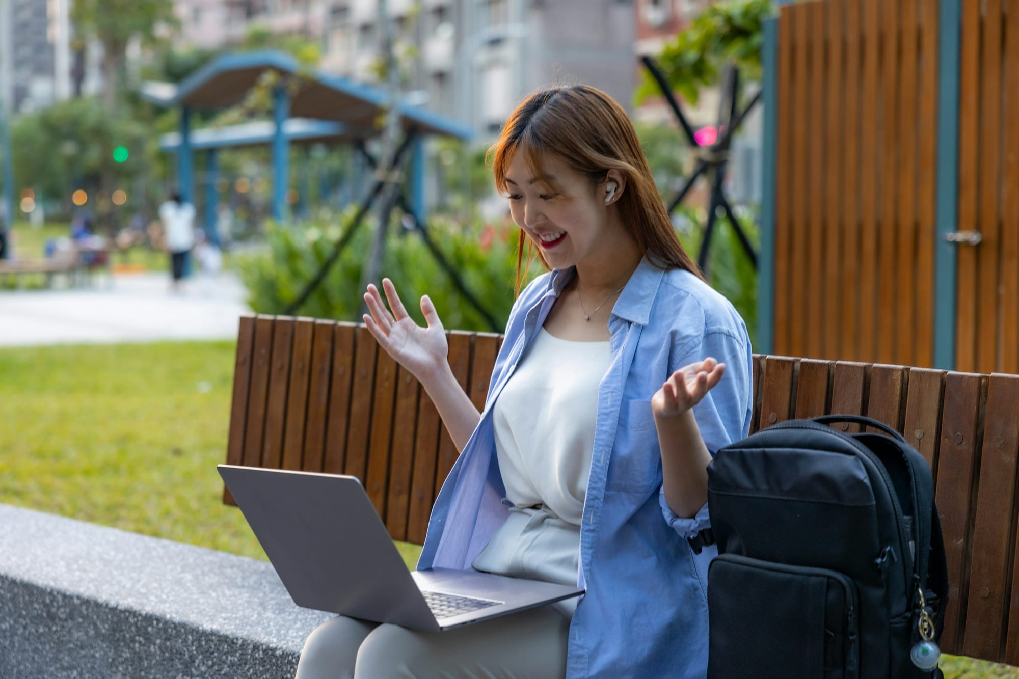 woman happily working with Best No-Code AI Platform