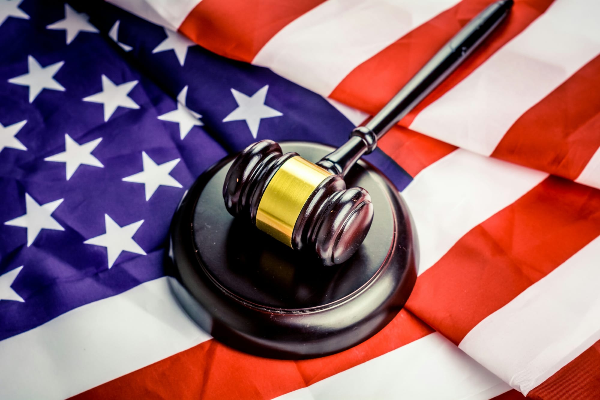 hammer of justice on US flag - Legal Workflow Automation Software