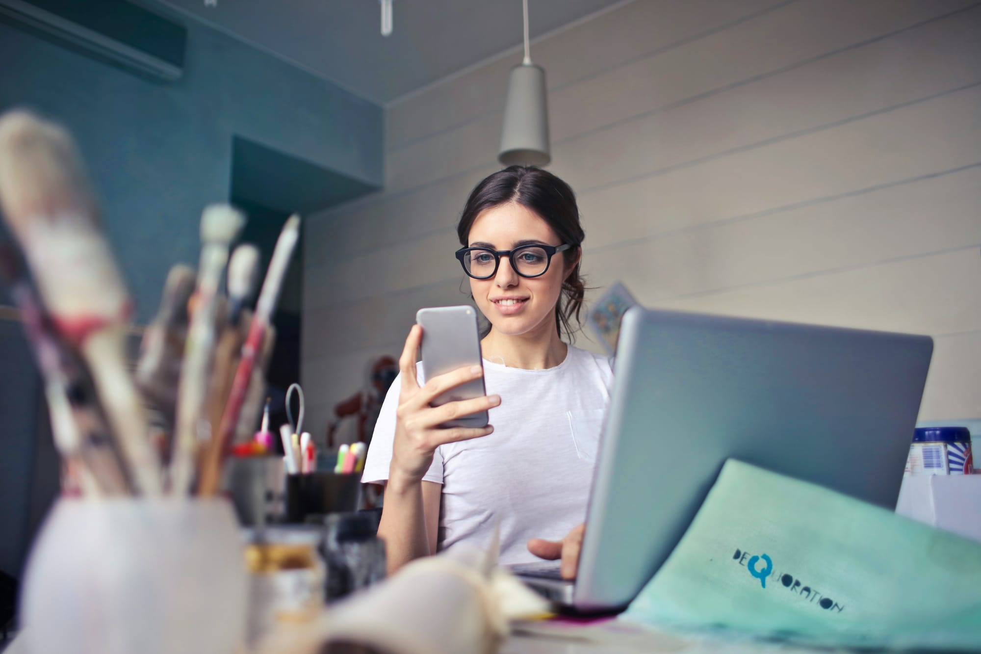 woman looking at her accounts - Social Media Automation