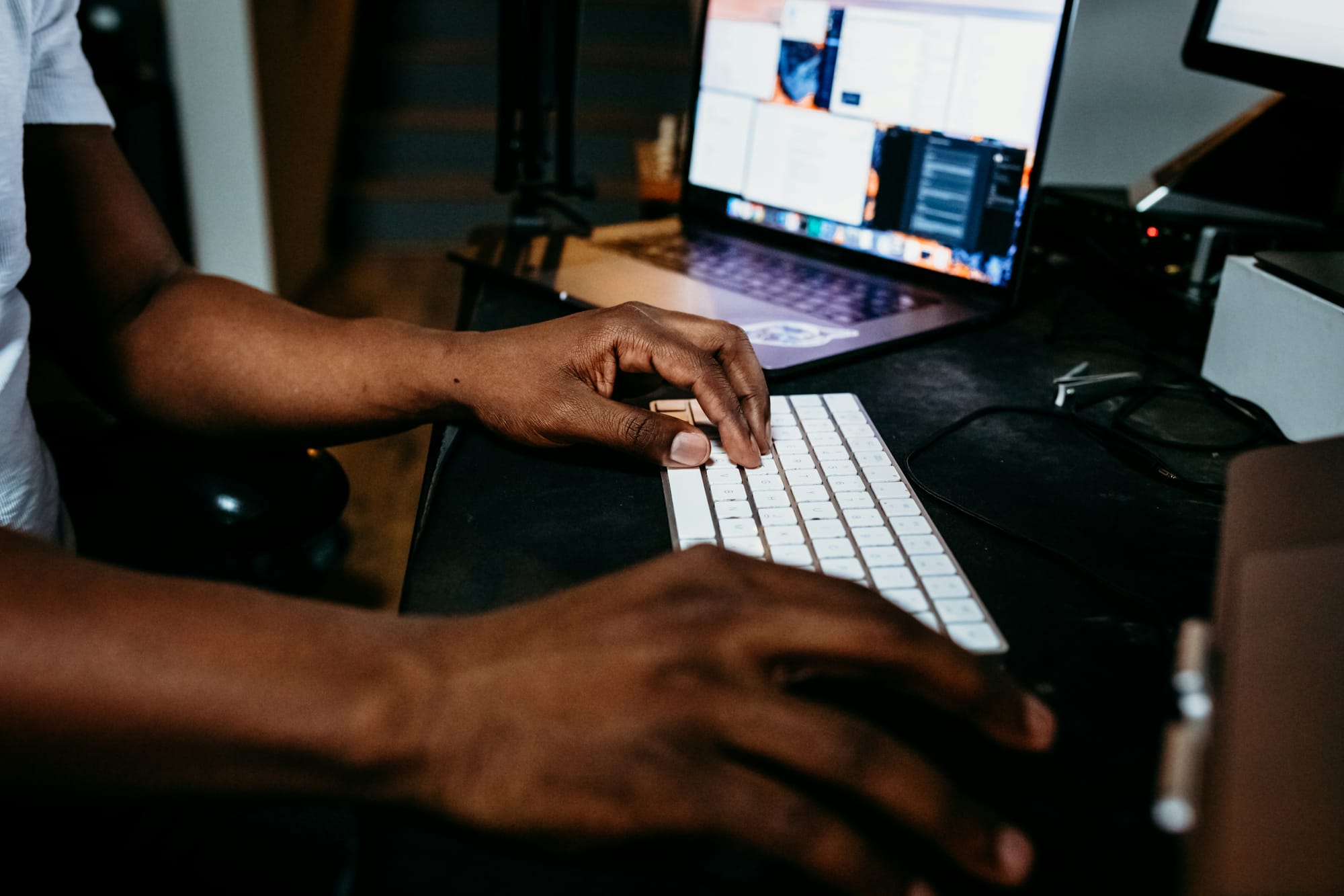 person on computer using Content Creation Tools