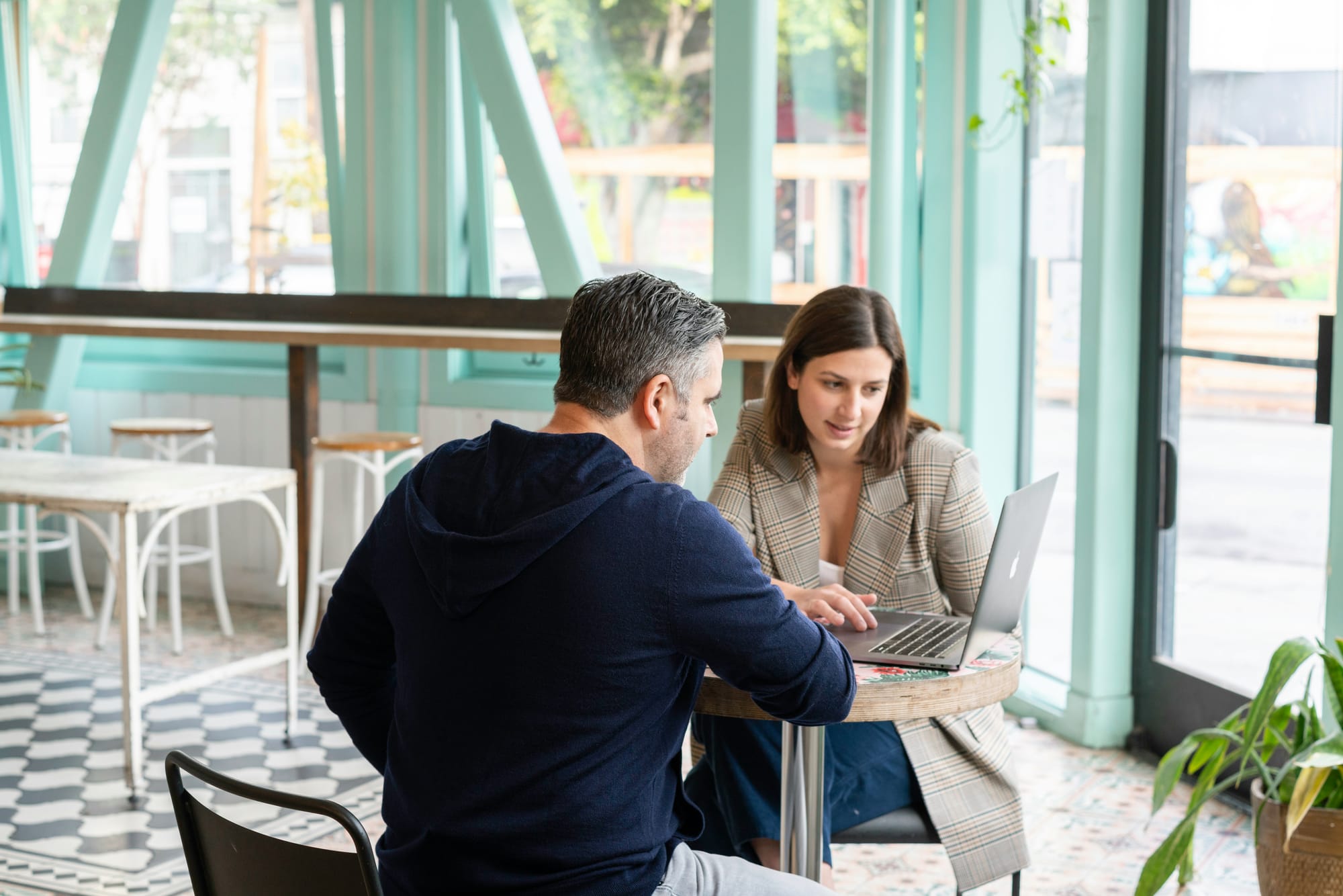 woman showing automated work - Sharepoint Workflow Automation