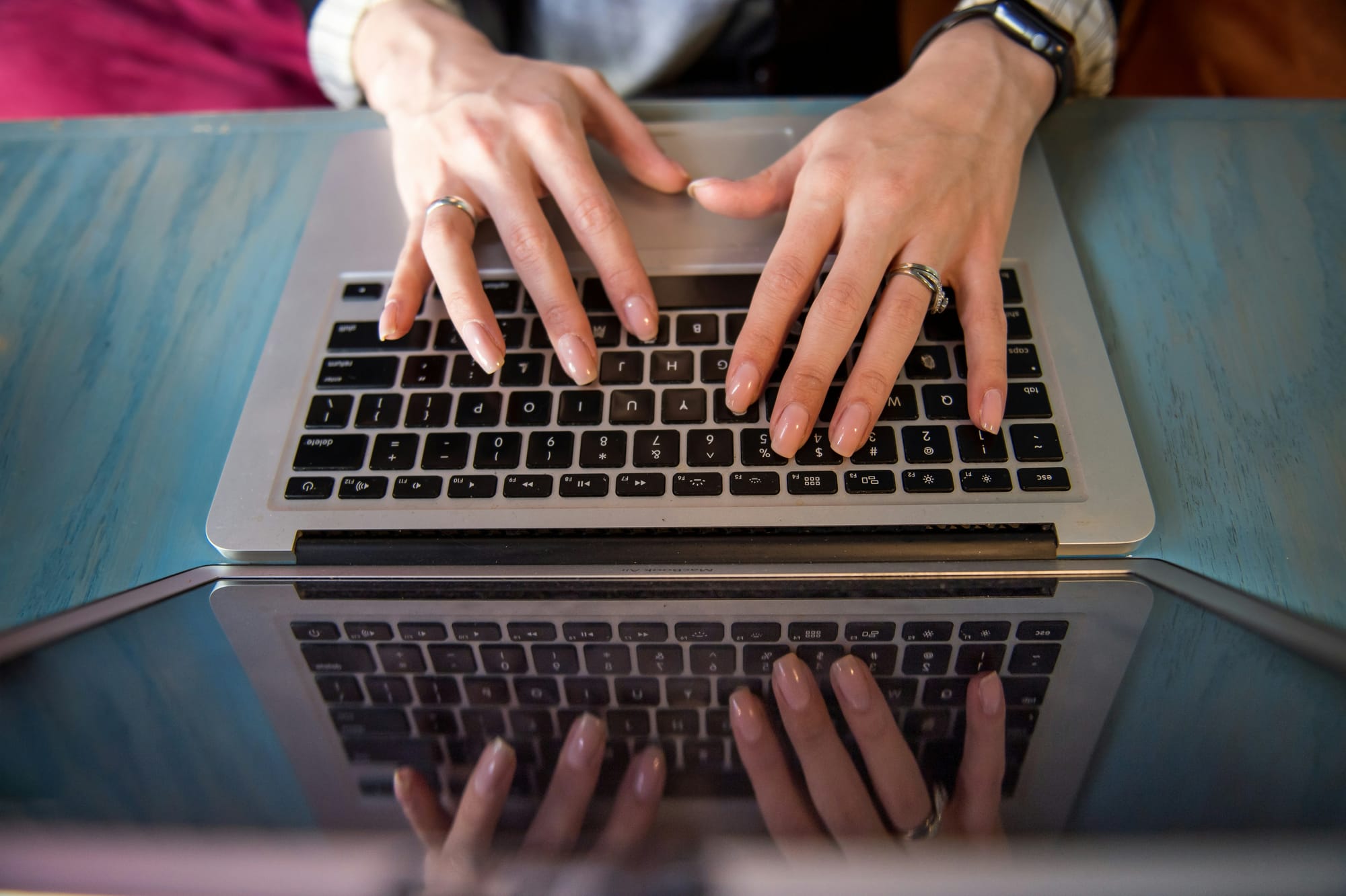 woman typing on laptop - Pipedrive Alternatives