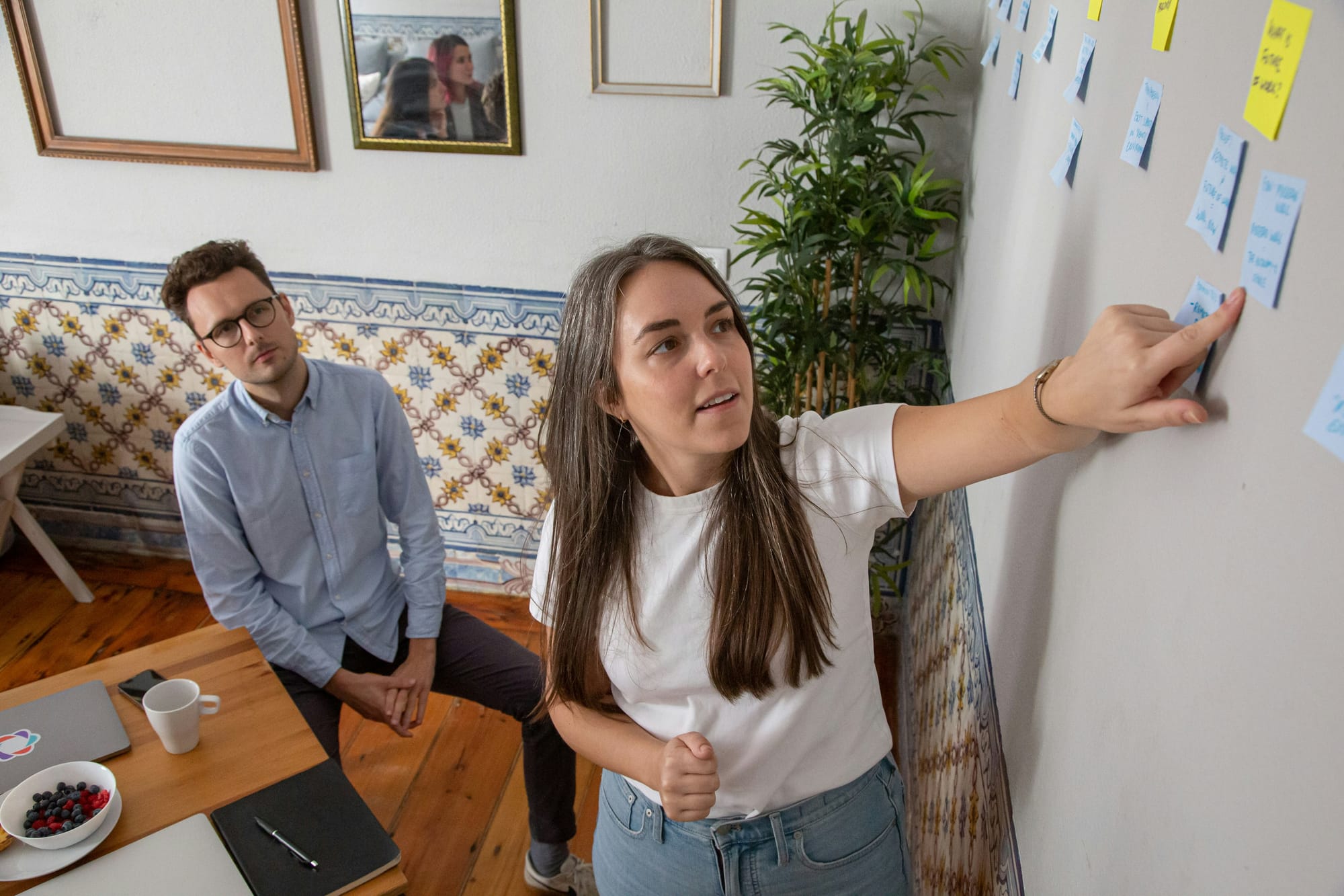 woman showing kpis to track - How Long Should A Cold Email Be