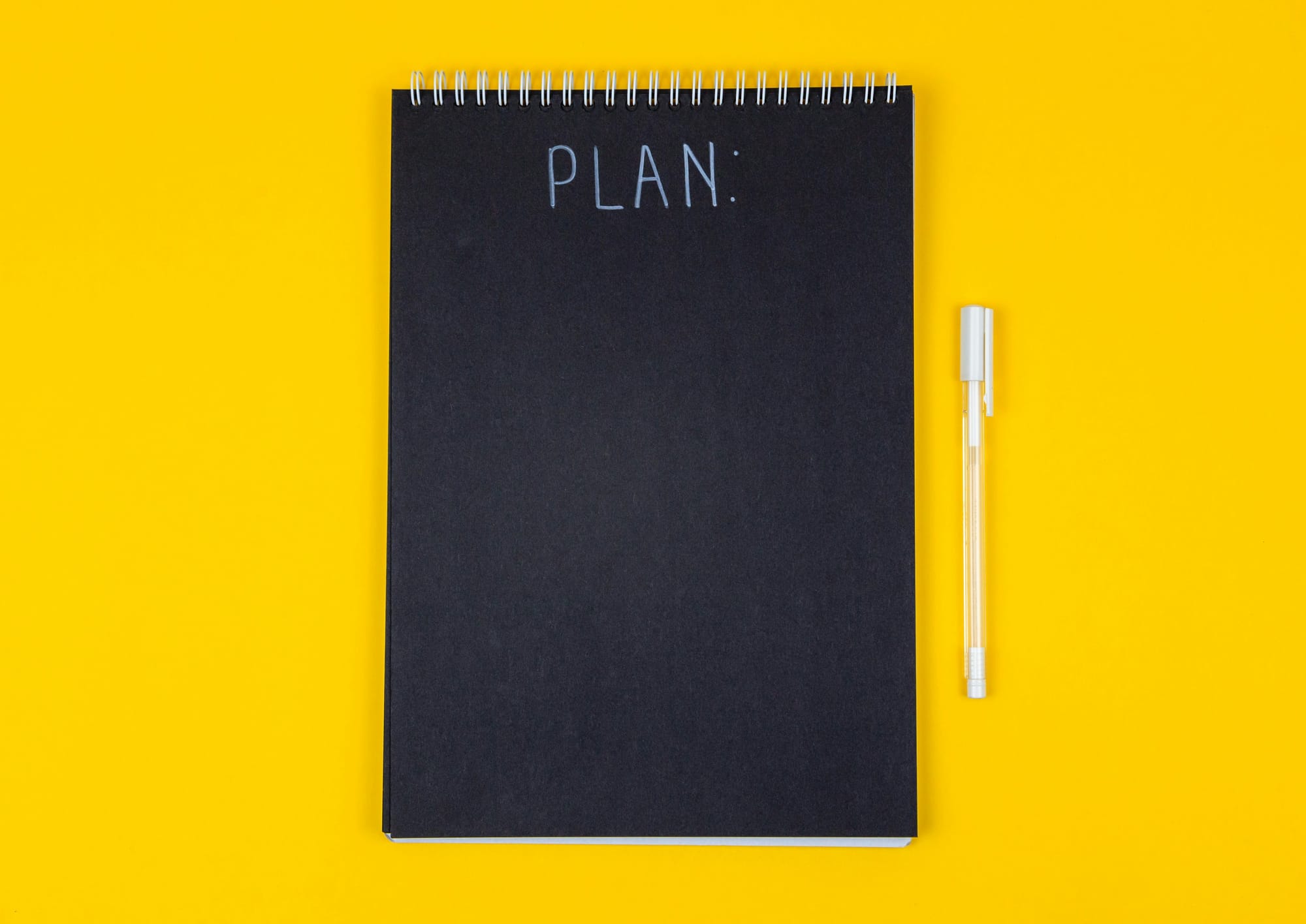 a book with plan written on it - Small Business Workflow Automation