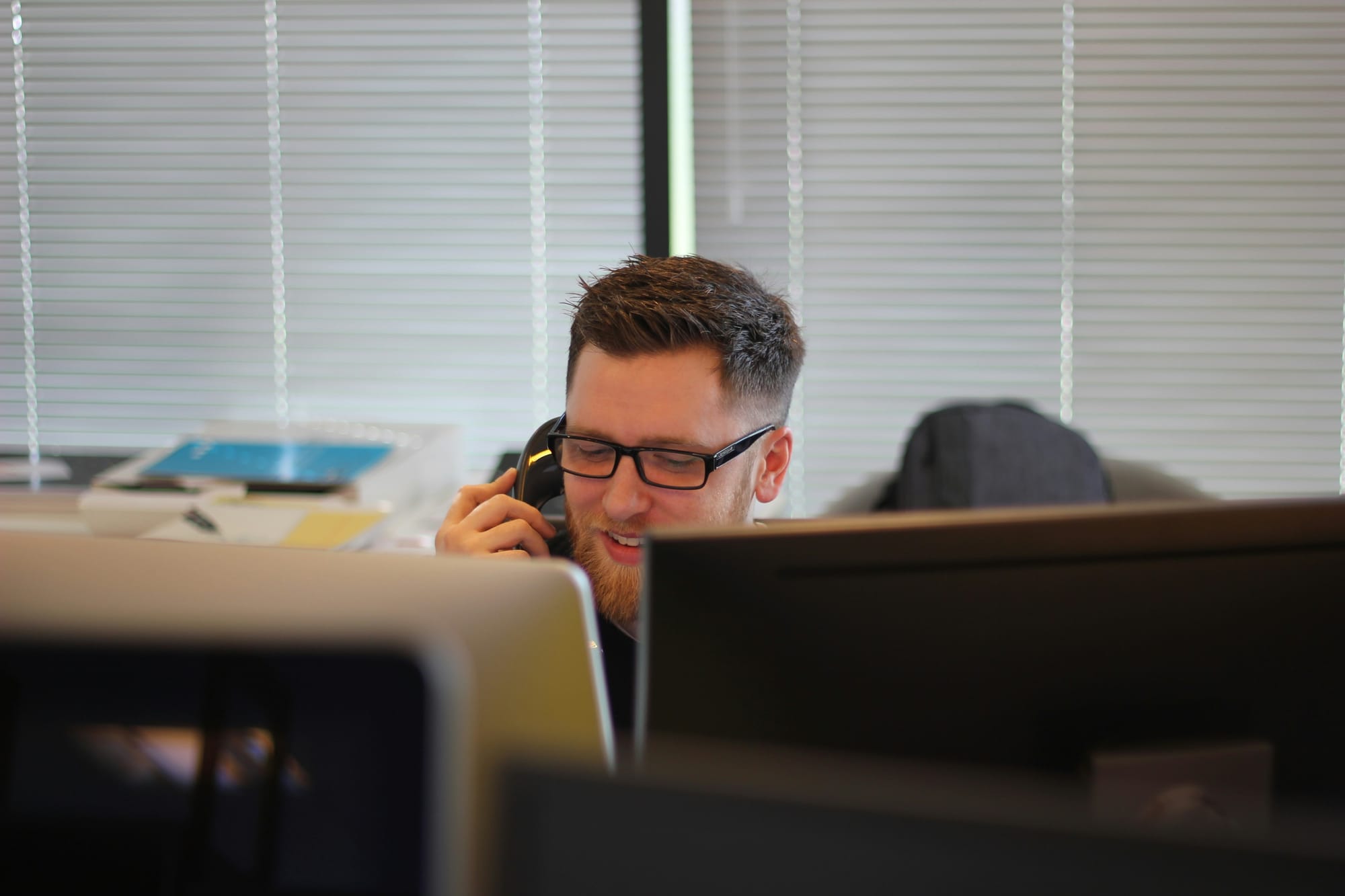 Sales Rep on the Phone with AI Sales Tools