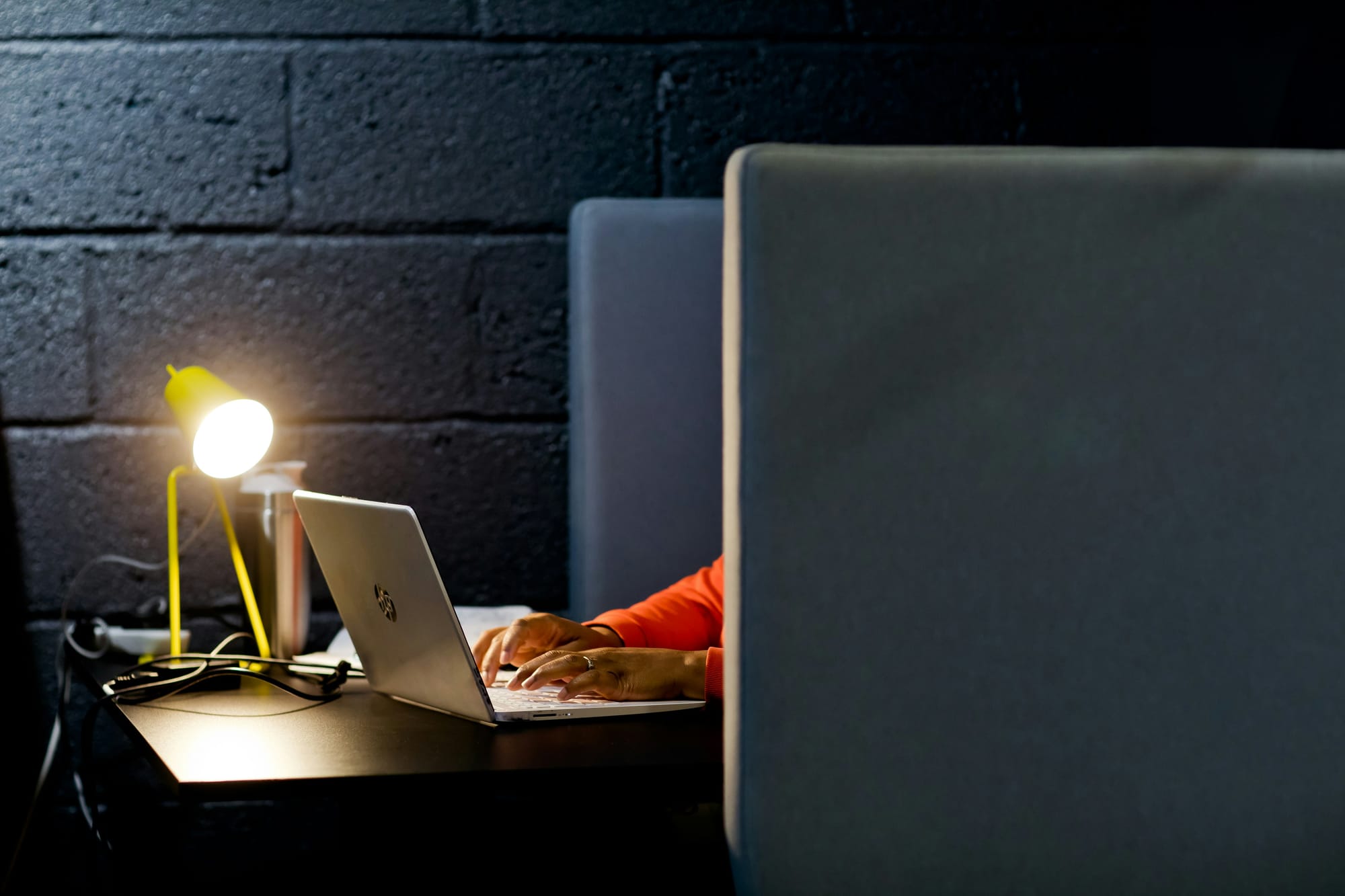 person in his cubicle using AI Content Creation Tools