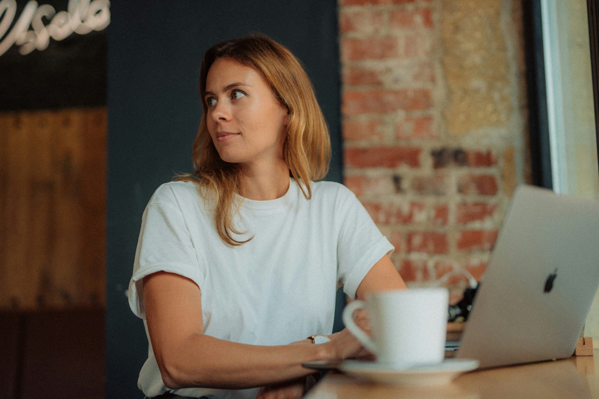 woman looking away from copyai to find Copy AI Alternatives