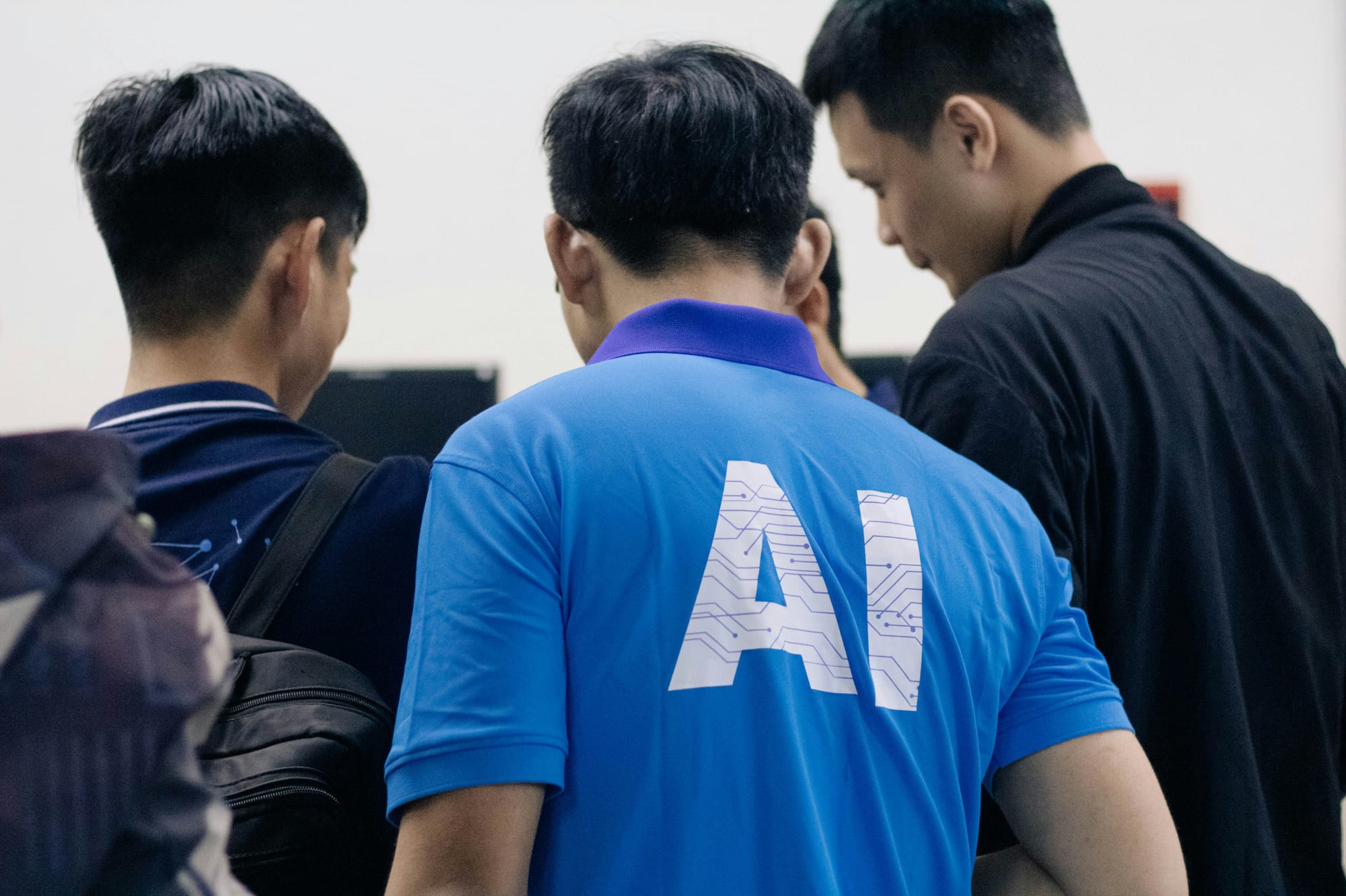 person with AI on his shirt - AI And Content Marketing