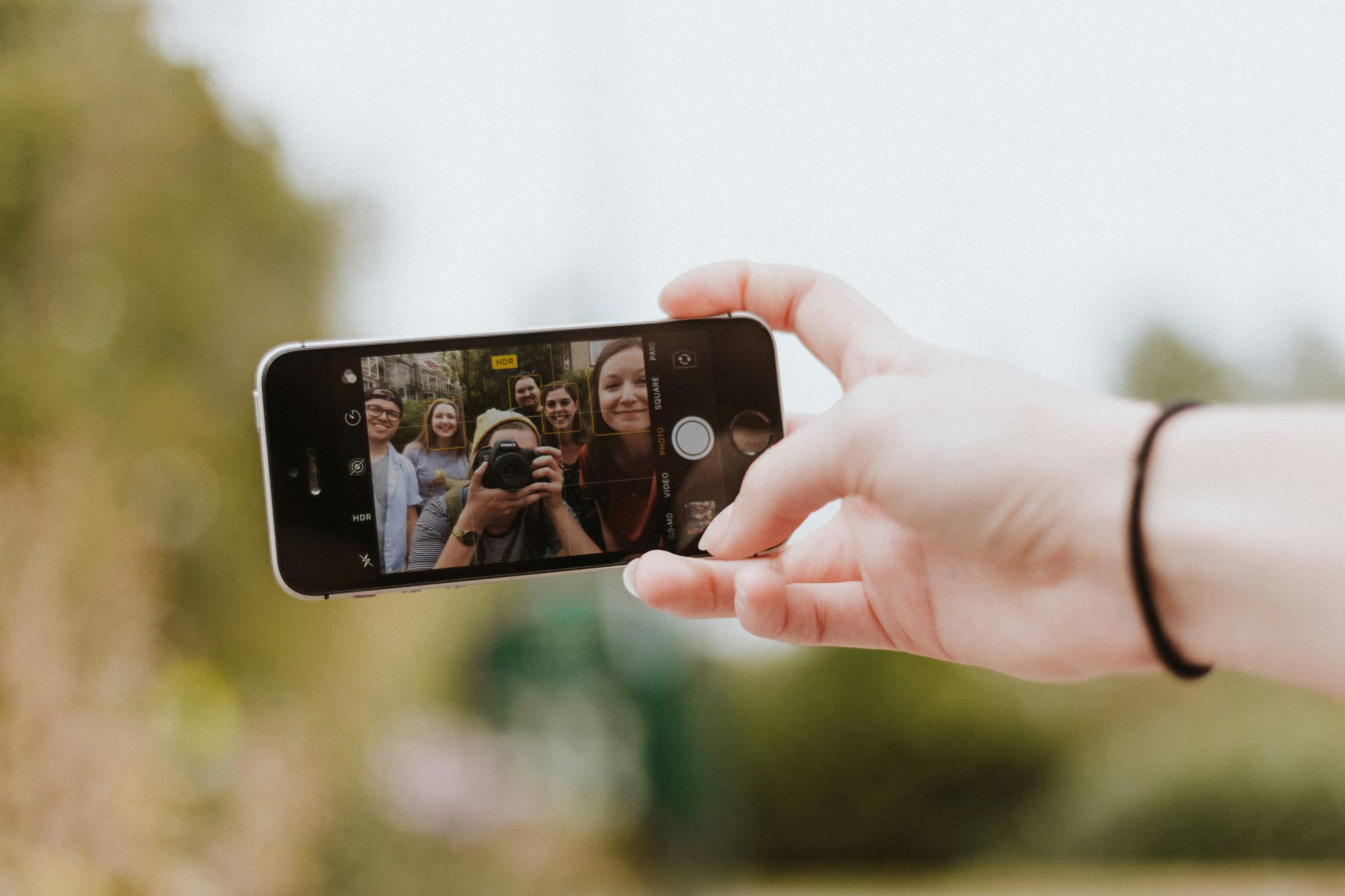 girl taking selfie - How To Automate Content Creation